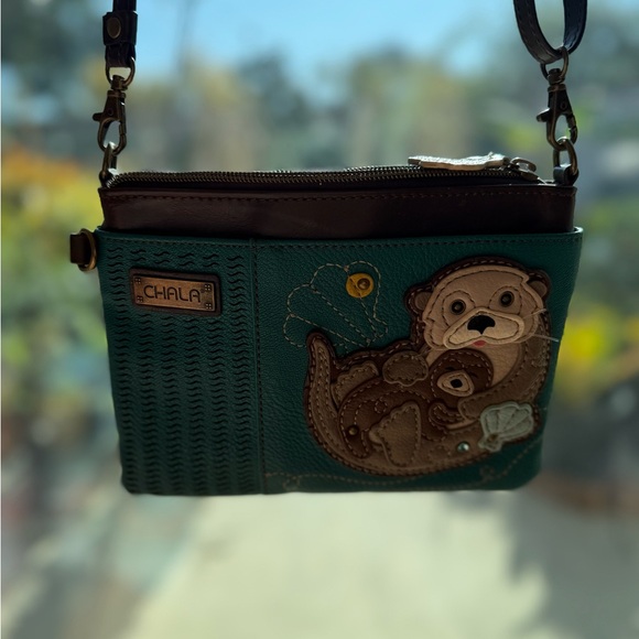 Turquoise Chala Crossbody Bag with Otter & Baby Design - Picture 2 of 10